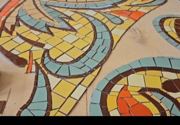 В Володарске началась реставрация уникального мозаичного панно «Народное искусство»